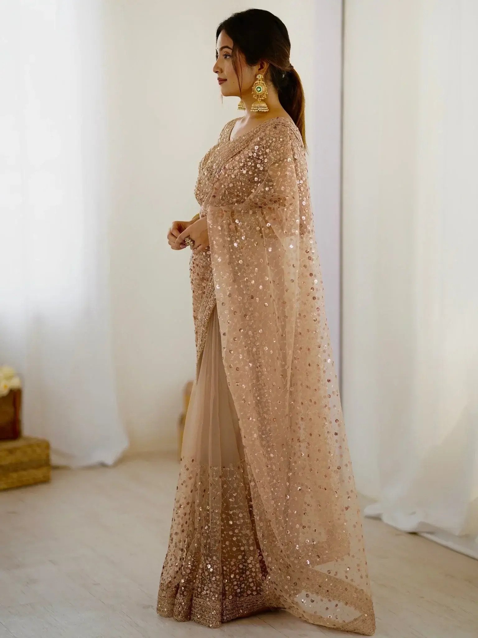 gorgeous-gold-net-sequins-party-wear-saree-with-blouse-8419340